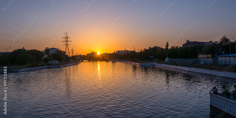 The Sunset on one of the channels of the city of Astrakhan. Astr
