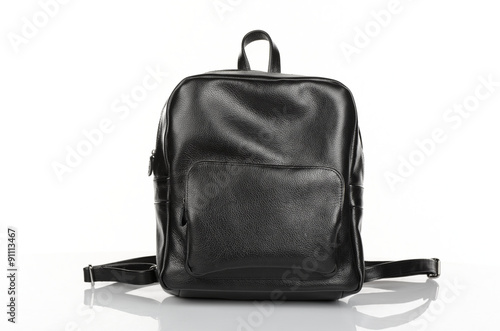 Black leather bag on white background