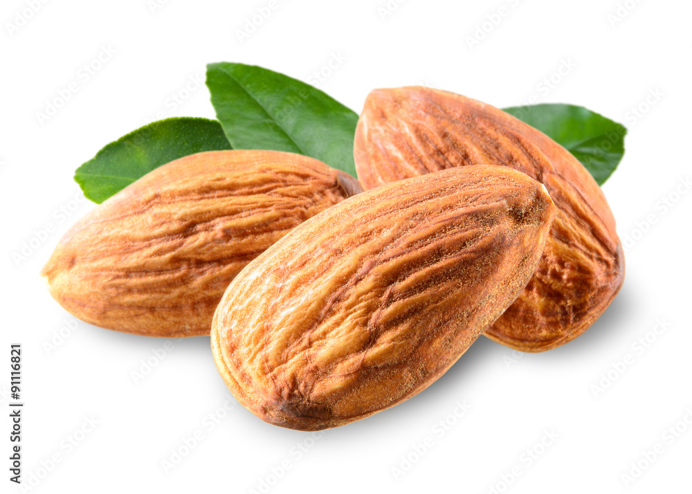 Almond. Nuts with leaves isolated on white background Almond. Nuts with leaves isolated on white background