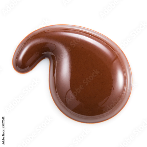 Drop of chocolate isolated on white background.