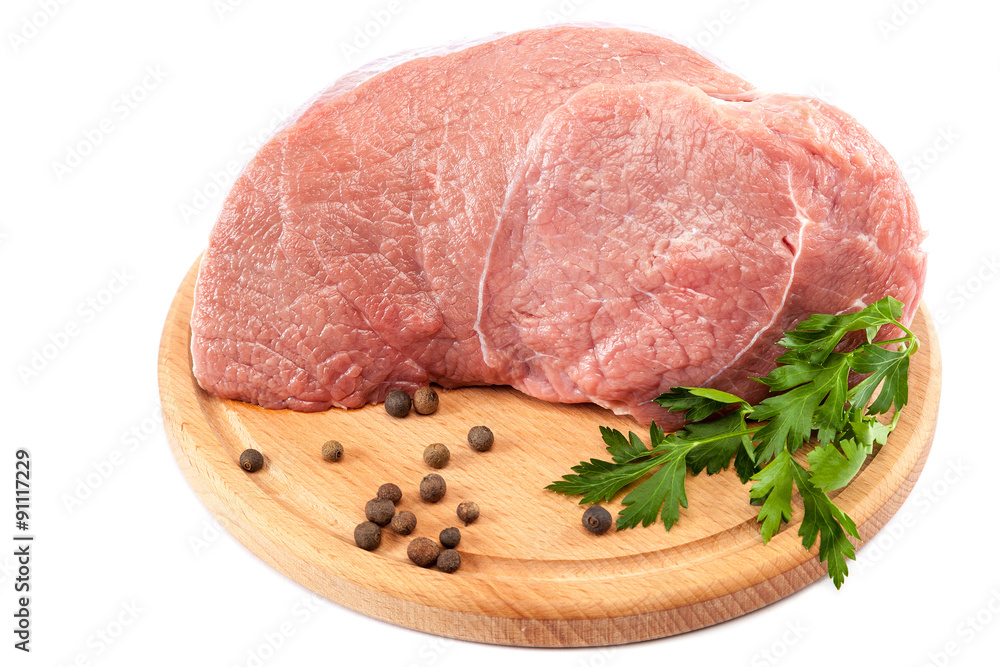 Meat on a cutting board on white background. Meat on a cutting board on white background.