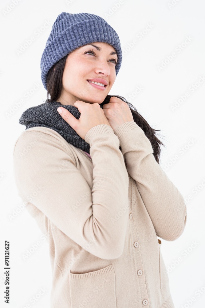 Attractive brunette looking up wearing warm clothes Attractive brunette looking up wearing warm clothes