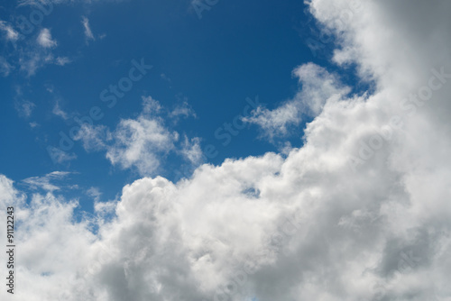 Blue sky with white clouds. Nature background. © Vladimir Arndt