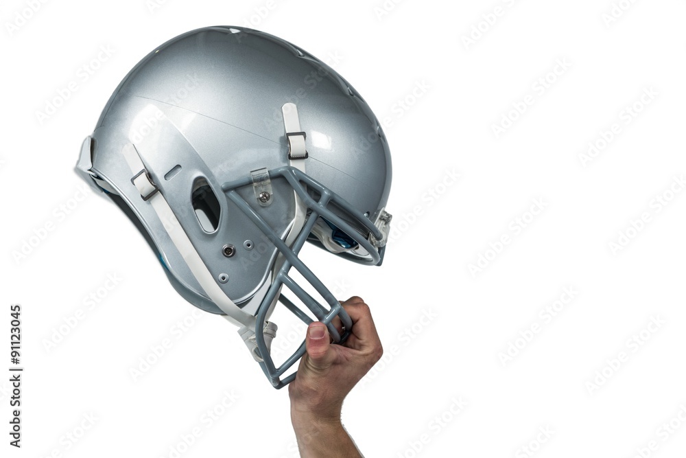 Fototapeta premium American football player handing his sliver helmet