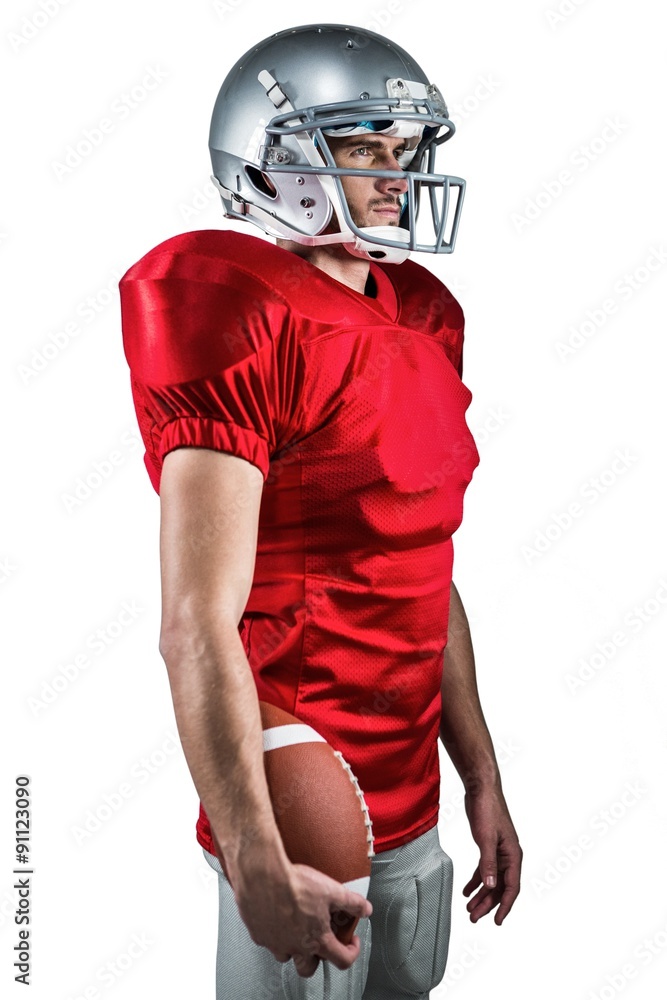 Serious American football player in red jersey 