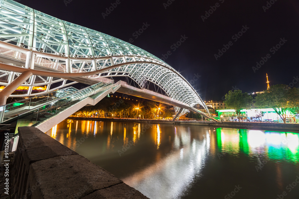 Tbilisi,Georgia- SEPTEMBER 8,2015: The peace bridge in Tbilisi, pedestrian bridge over the Mtkvari River in Tbilisi. On SEPTEMBER 8,2015. Tbilisi.Georgia