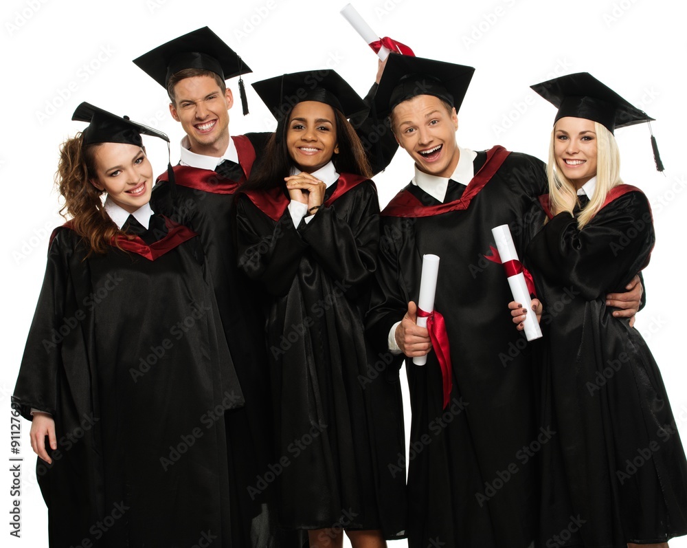 Multi ethnic group of graduated young students isolated on white Multi ethnic group of graduated young students isolated on white