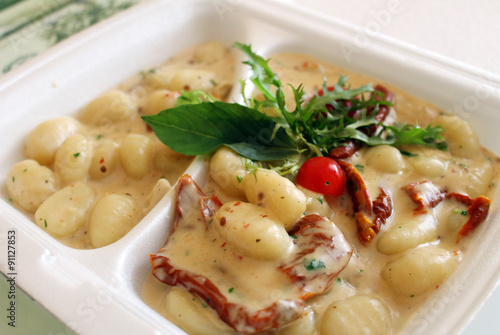 Restaurant lunch menu with tasty gnocchi and sauce