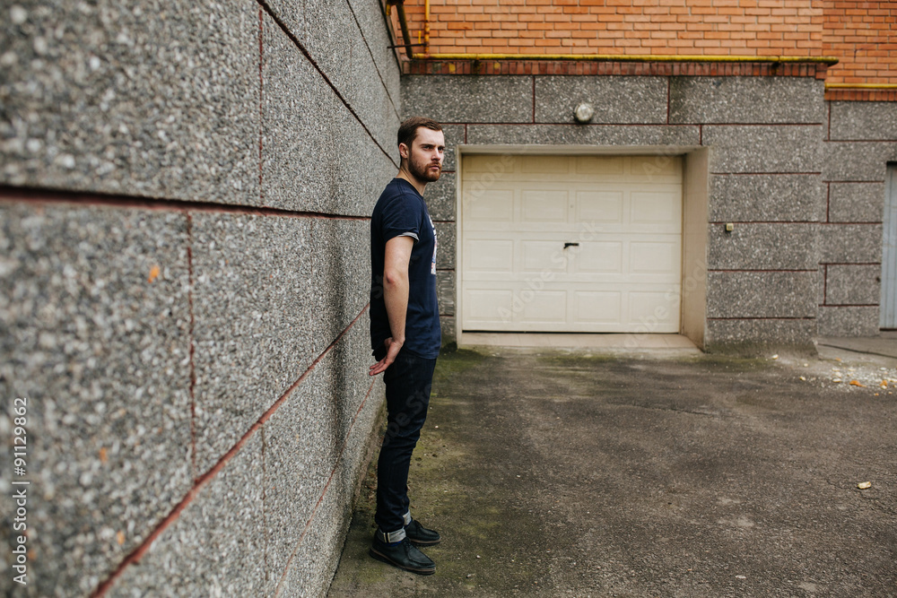 Confident man posing in selvedge  jeans