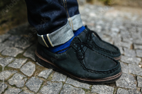 Confident man posing in selvedge jeans