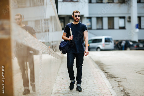 Tableau sur toile Confident man posing in selvedge  jeans