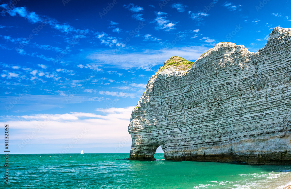 Naklejka premium Famous natural cliffs in Etretat. Etretat is a commune in Seine-