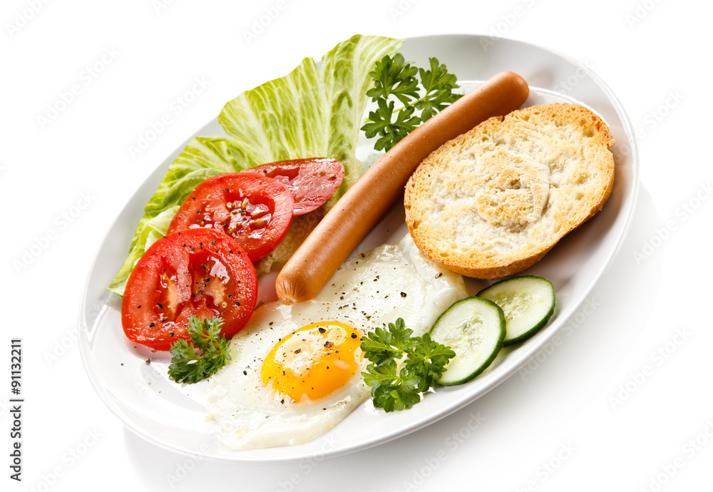 Breakfast - fried egg and sausage Breakfast - fried egg and sausage