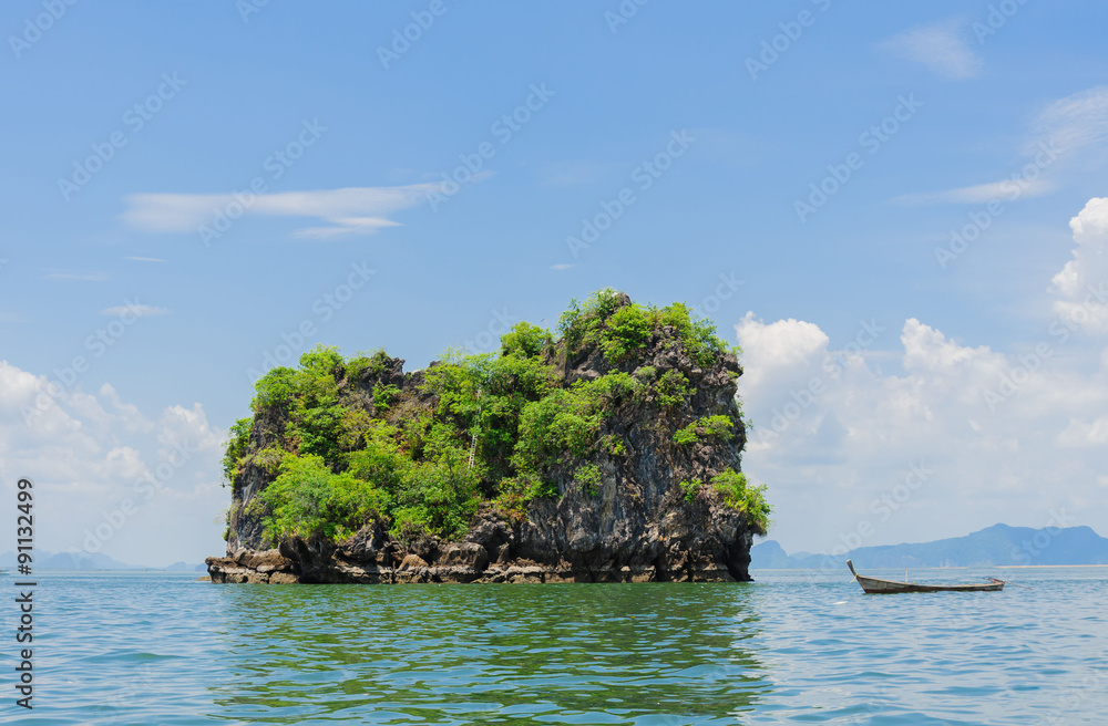 Small island on sea and White cloud on blue sky Small island on sea and White cloud on blue sky