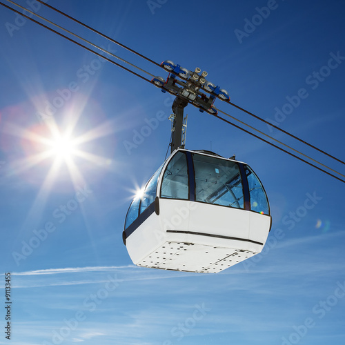 Cable car and sun