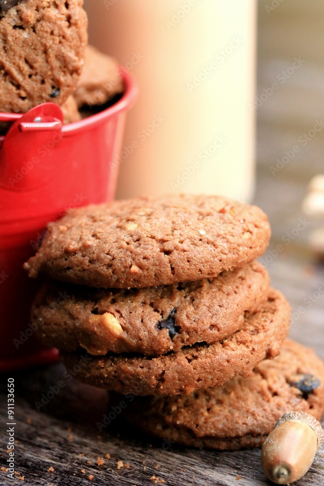 Fototapeta premium Tasty chocolate chip cookie and sour milk