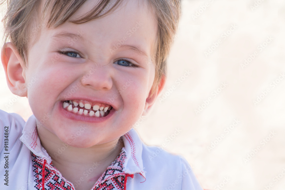 Cute and happy little boy laughing Cute and happy little boy laughing