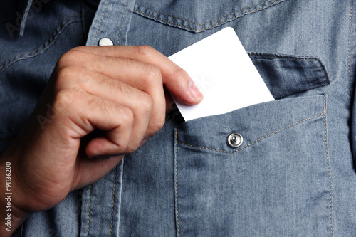 man holding a blank card