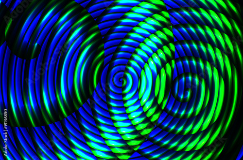 Colorful spirals on a dark background photo