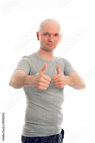 Fotografija man with bald head and thumbs up