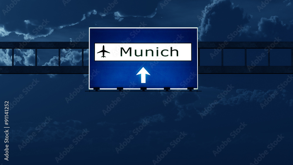 Munich Germany Airport Highway Road Sign at Night Munich Germany Airport Highway Road Sign at Night