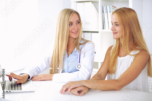 Doctor with patient in hospital