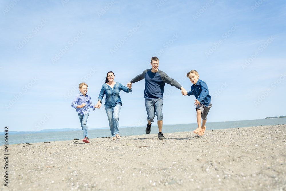 Portrait of a Family having fun at the beach Portrait of a Family having fun at the beach