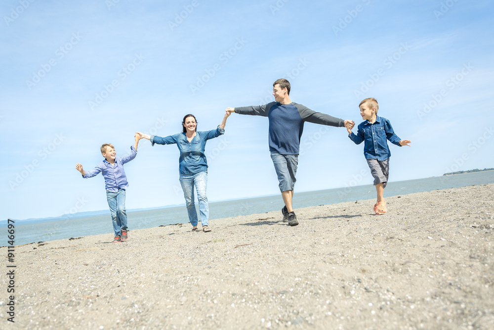 Portrait of a Family having fun at the beach Portrait of a Family having fun at the beach