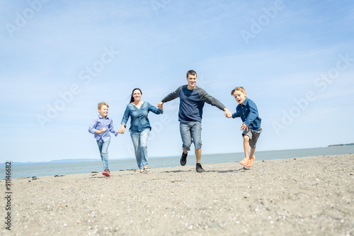 Portrait of a Family having fun at the beach