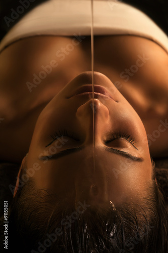 Shirodhara massage - close-up photo
