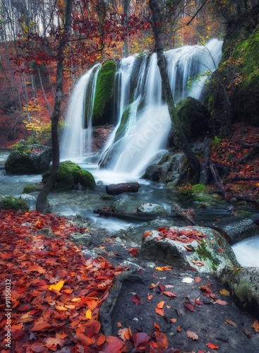 Beautiful waterfall in autu...