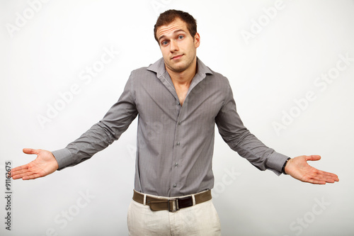 Mistake or sorry concept - confused man looking innocent