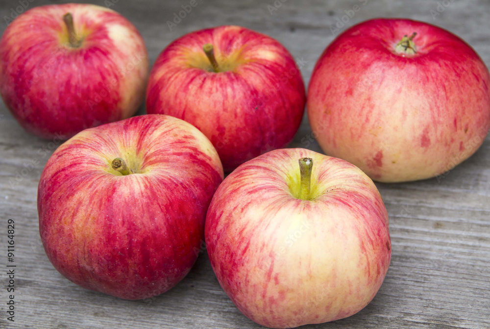 Red apples on a wooden Red apples on a wooden