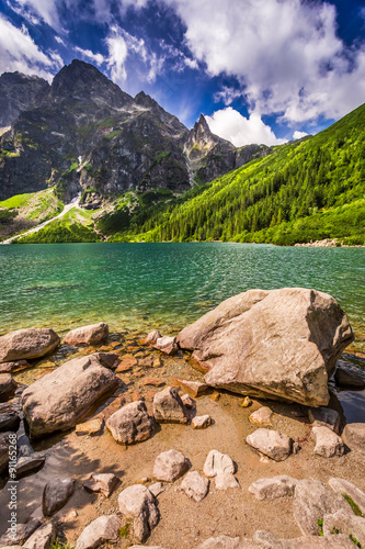 Fototapeta Naklejka Na Ścianę i Meble -  Lake in the middle of the mountains at summer