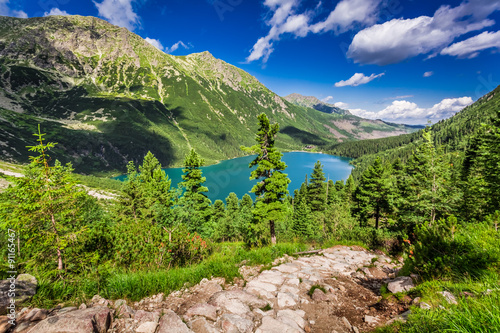 Fototapeta Naklejka Na Ścianę i Meble -  Beautiful lake in the middle of the mountains at summer