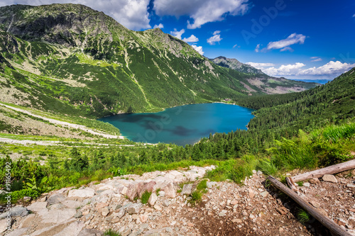 Fototapeta Naklejka Na Ścianę i Meble -  Beautiful lake in the middle of the mountains at dawn