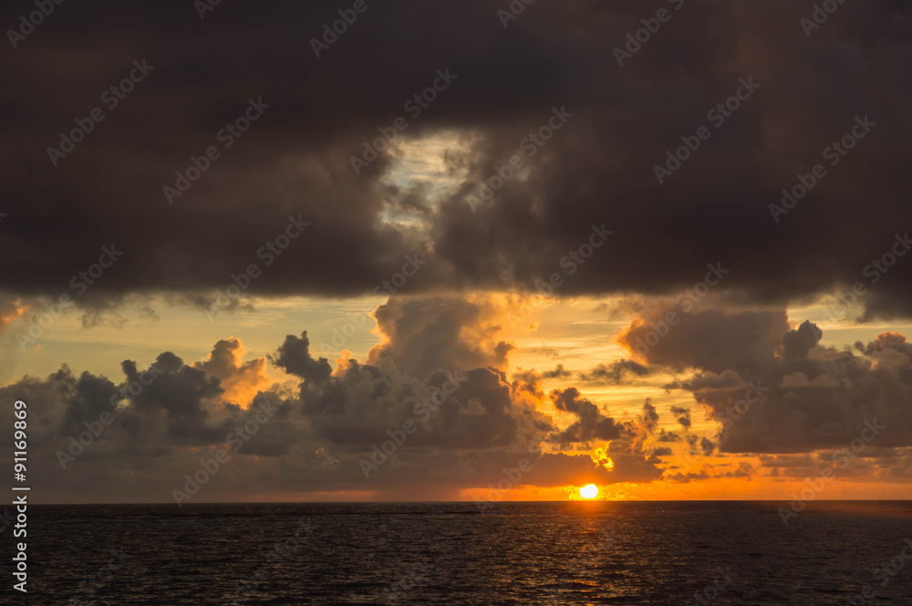 Beautiful cloudy sky at sunset in the tropics