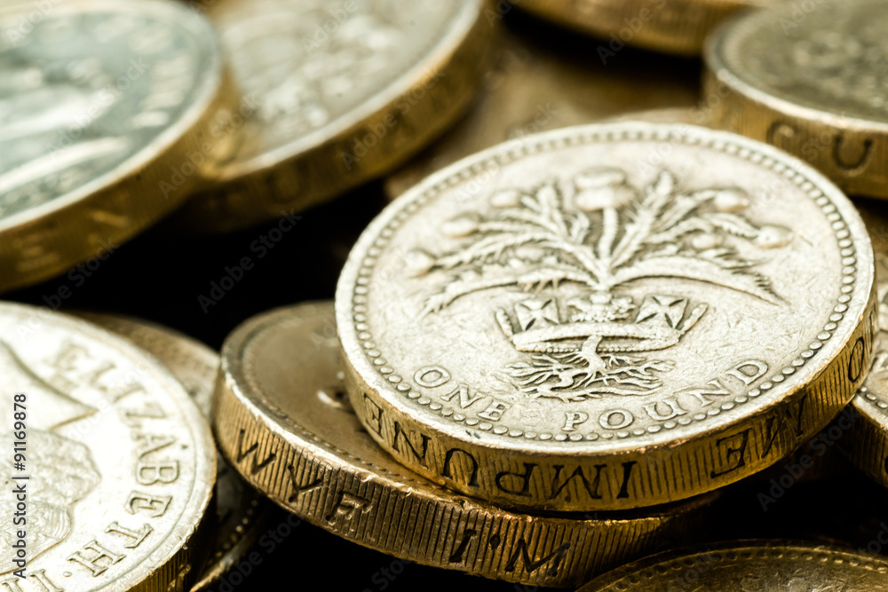 Macro Close Up of Assorted British Pound Coins Macro Close Up of Assorted British Pound Coins