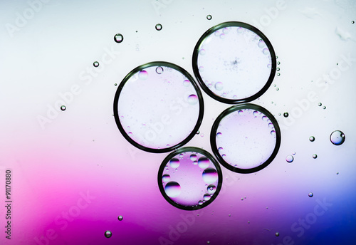 Background of colorful oil drops in water
