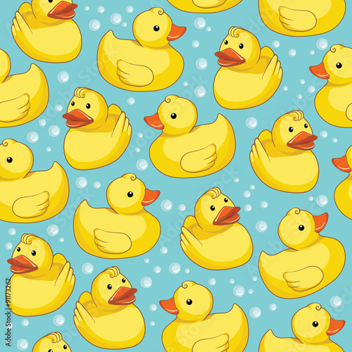 Vector seamless pattern with yellow ducks