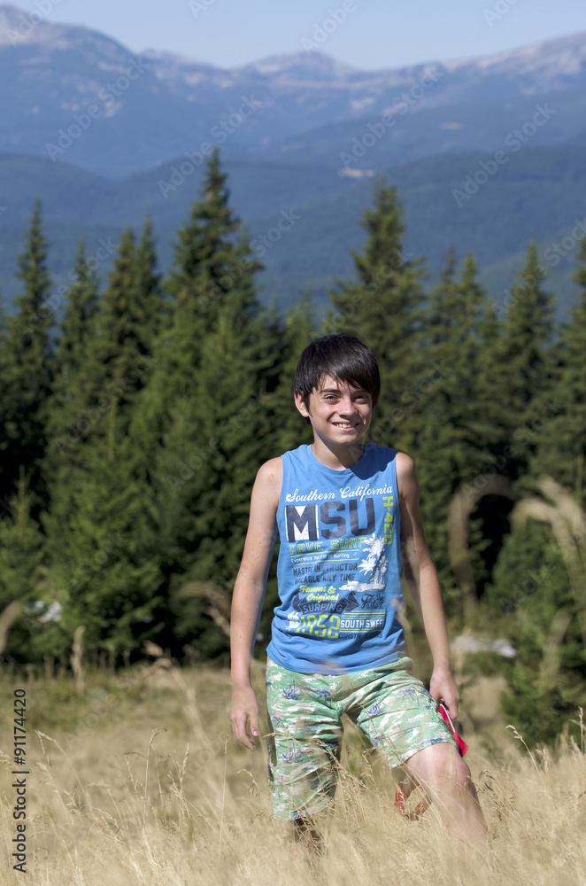 Boy hiking in bulgarian mountain.