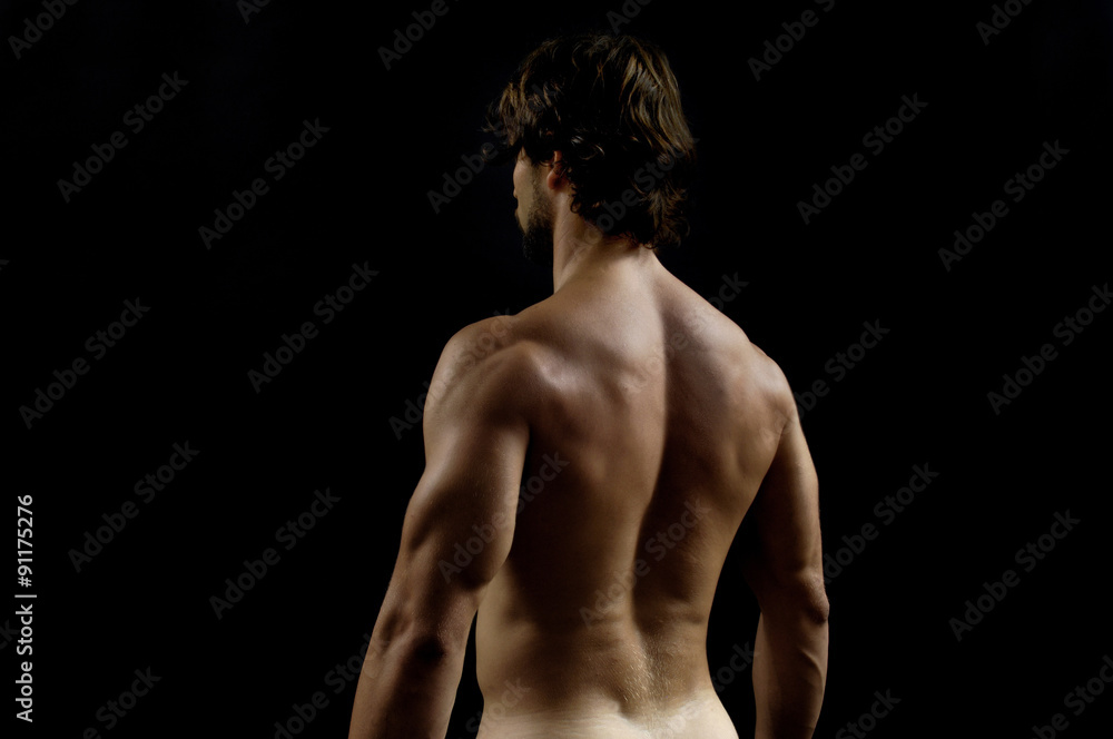studio photography of a man with His back,