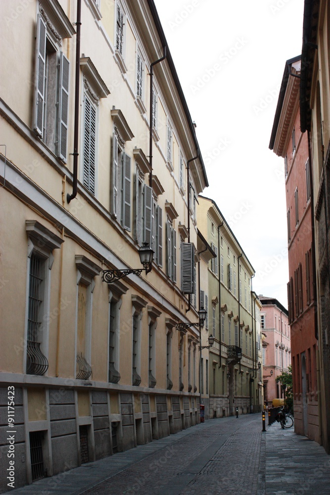 narrow beautiful alley in in Parma Italy