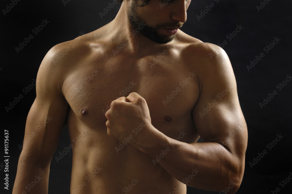 portrait of a man with biceps