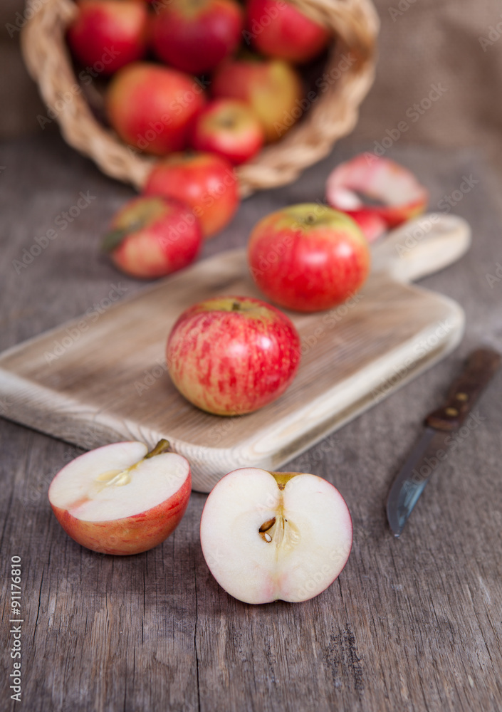 Autumn crops: red apples on a dark wooden table Autumn crops: red apples on a dark wooden table
