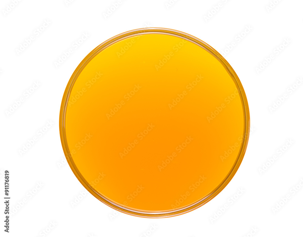 Glass of orange juice from above