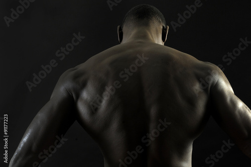 back of a naked African boy