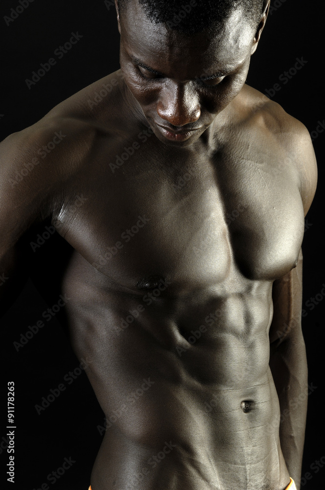 Fototapeta premium A black man with a muscular body,