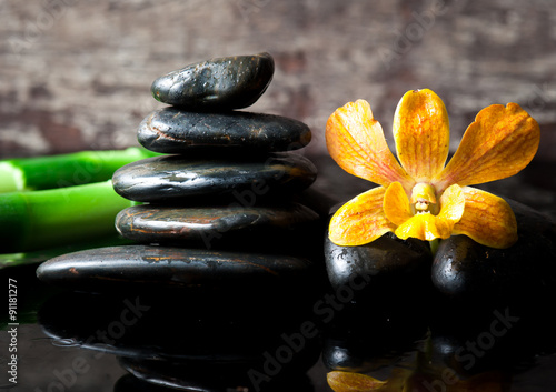 Photography spa concept zen stones and orchid,wood background