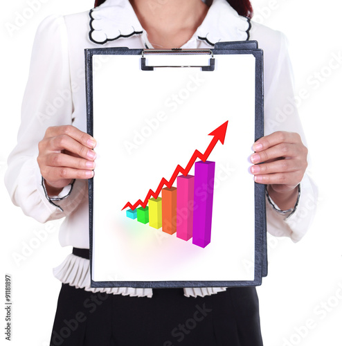 business woman holding a clipboard with business graph photo